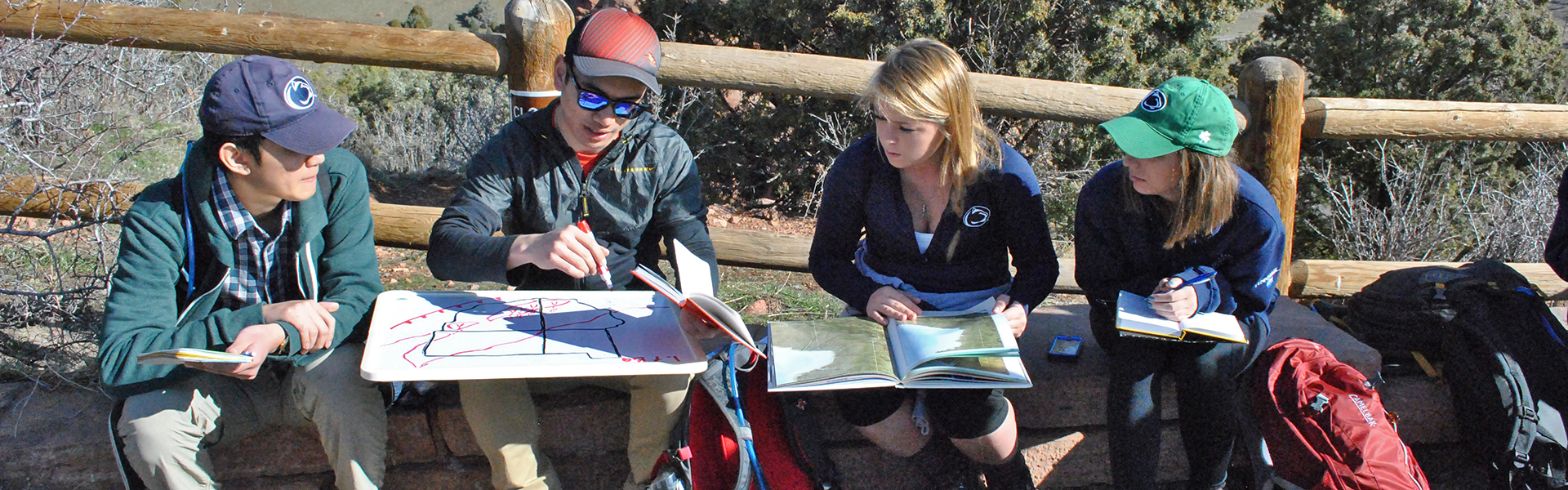 student making map in field